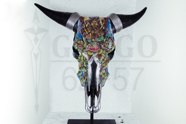 Skulls of cow gone up on metal base. Height 40. Width 23.</br> © RODRIGUE GREGO 